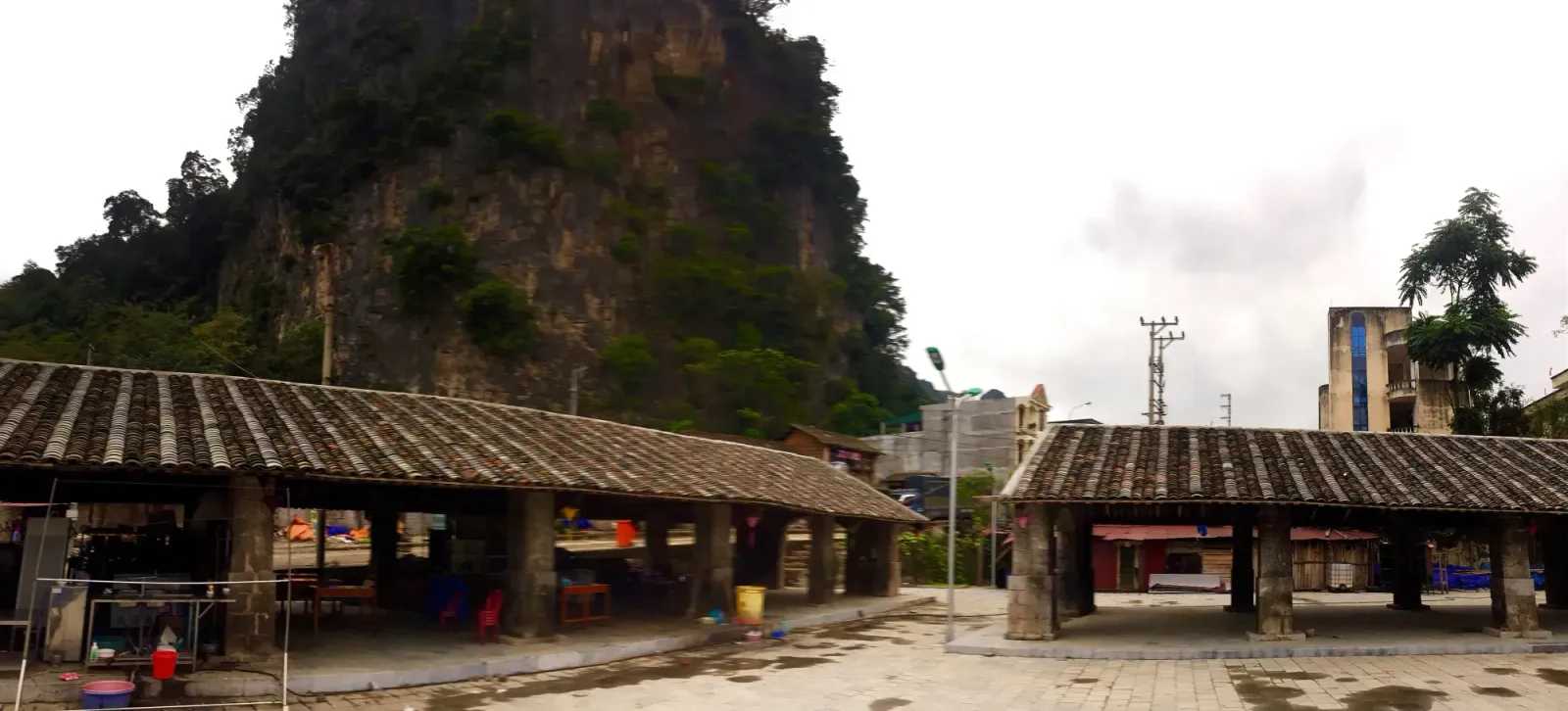 The old stone-roofed market below the cliffs in Dong Van town