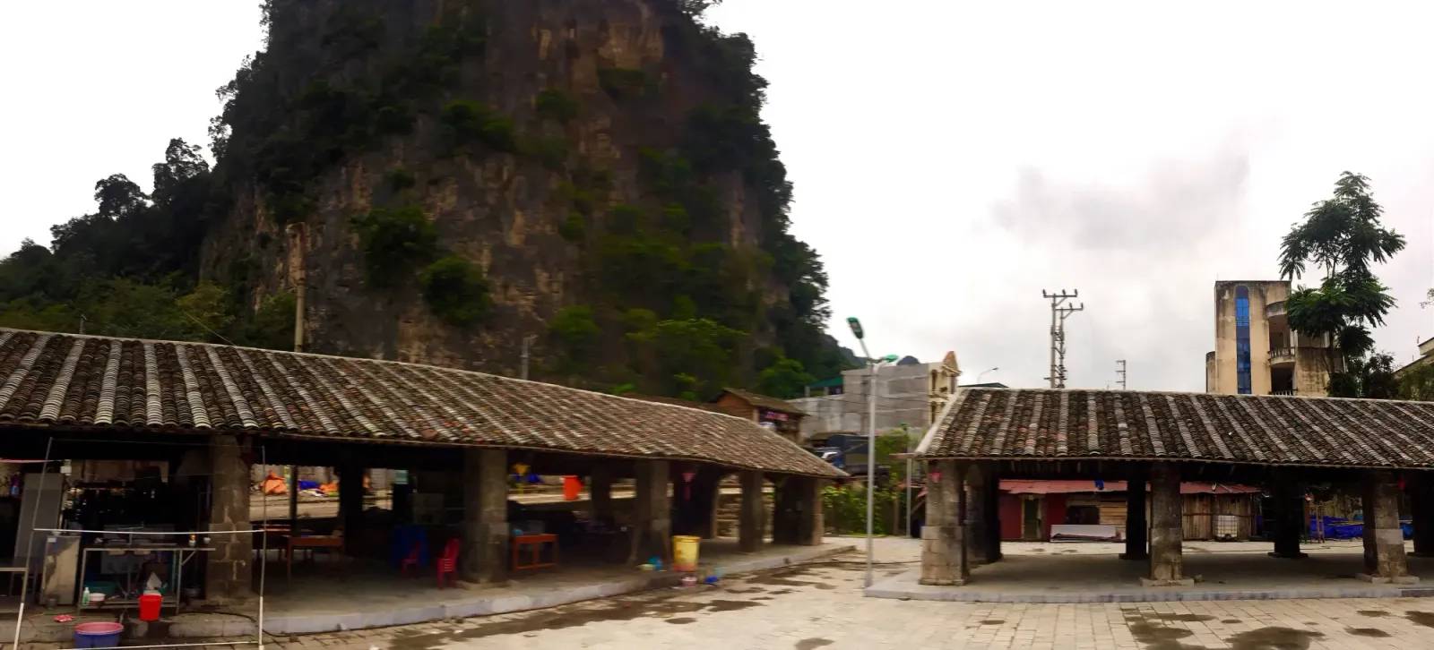 The old stone-roofed market below the cliffs in Dong Van town